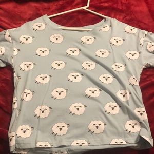 Light blue women’s shirt with sheep